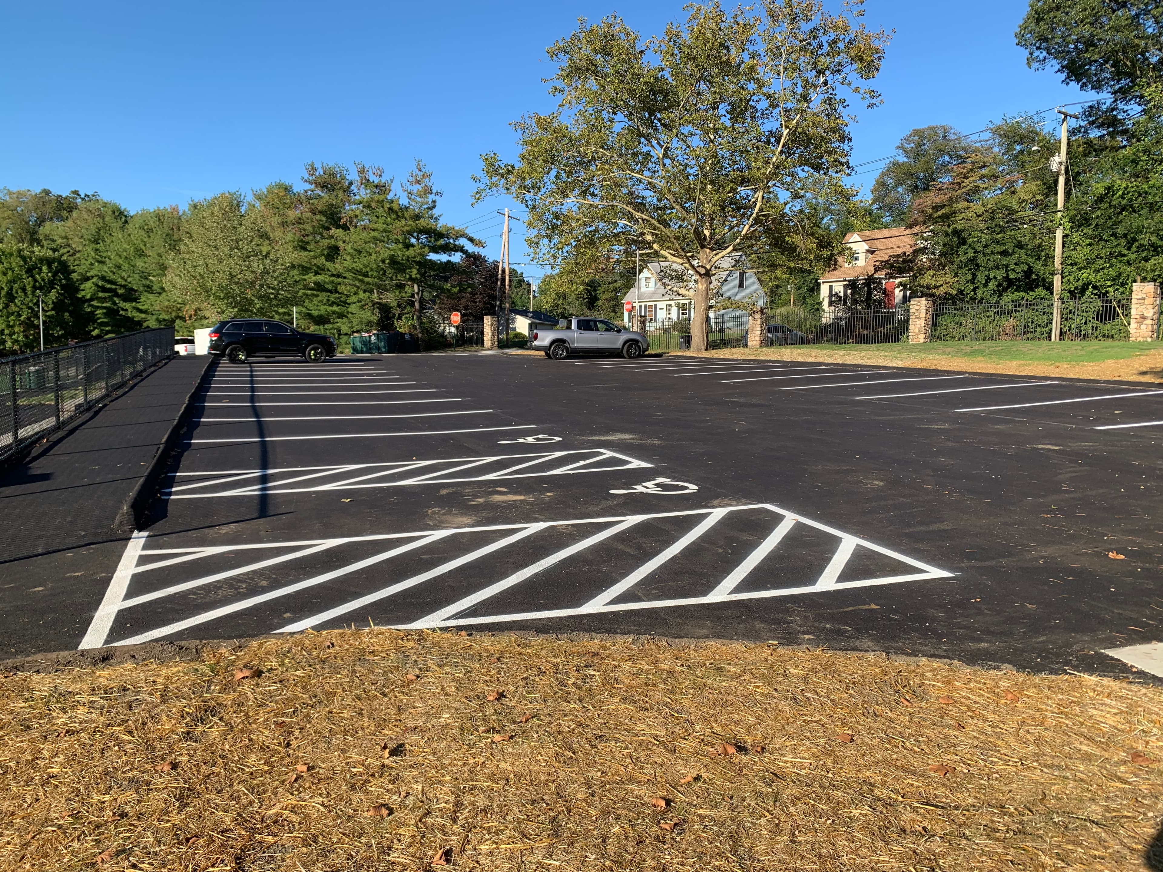 Full layout municipal parking lot in Fairfield CT with ADA stalls, crosswalks, and directional arrows Full layout municipal parking lot in Fairfield CT with ADA stalls, crosswalks, and directional arrows
